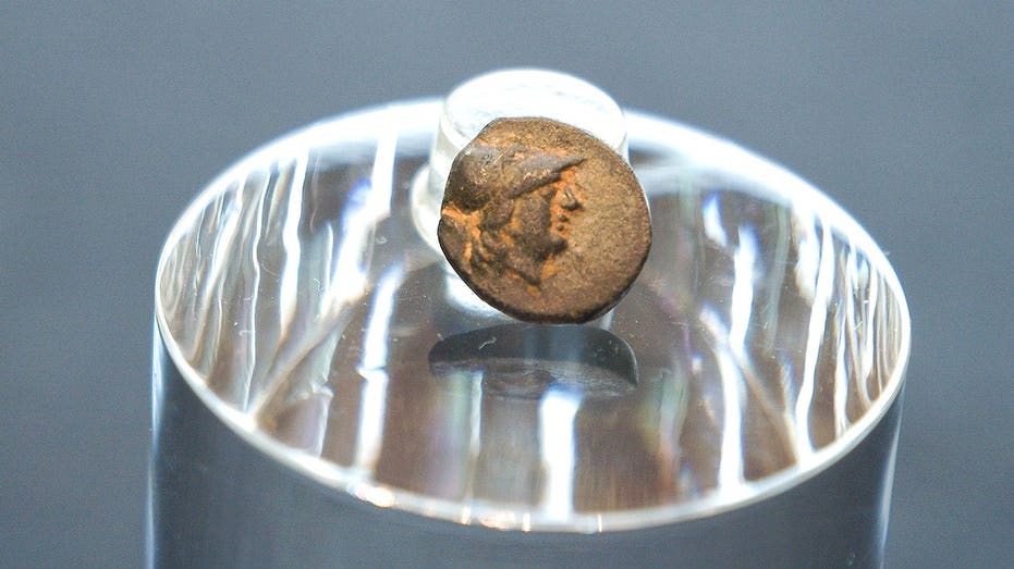Teen stumbles on mysterious coin from legendary city, puzzling archaeologists over its journey Education VIC